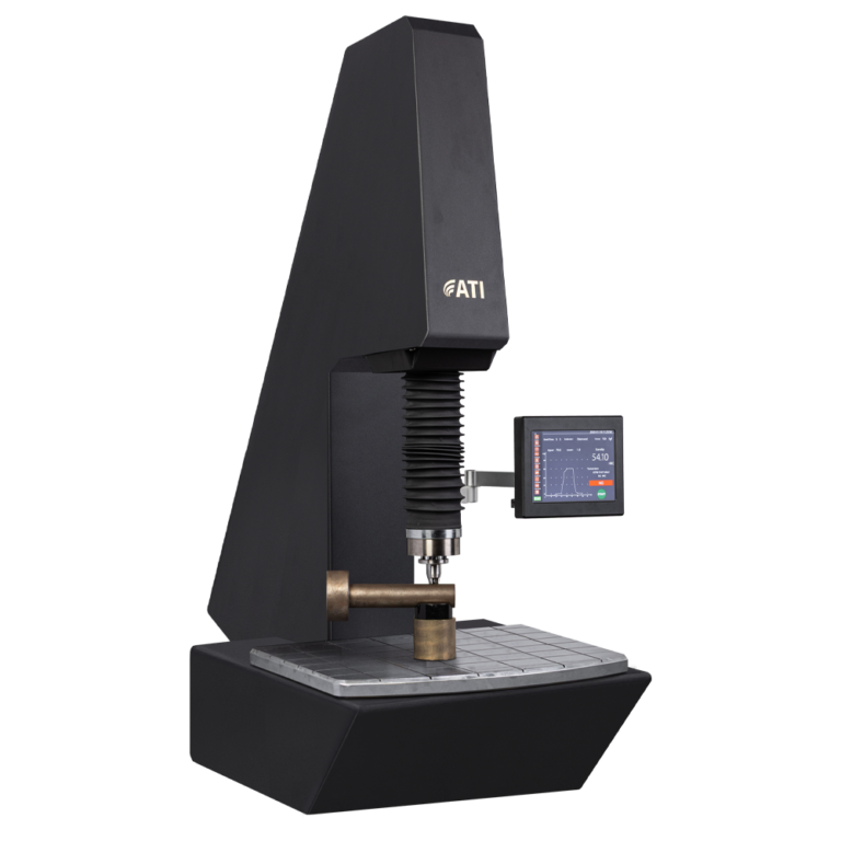 Modern hardness testing machine with digital display for precise material assessment.