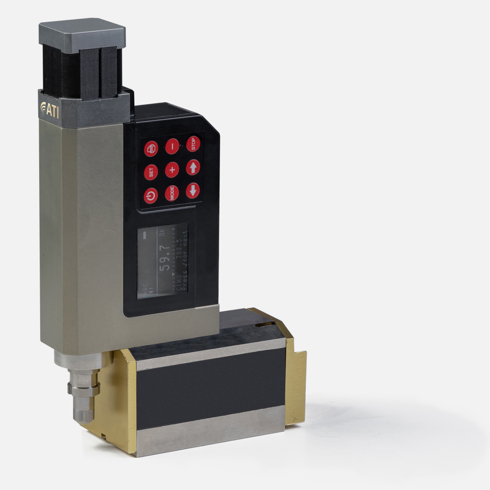 Robotic tool changer with control panel and display for automated systems.